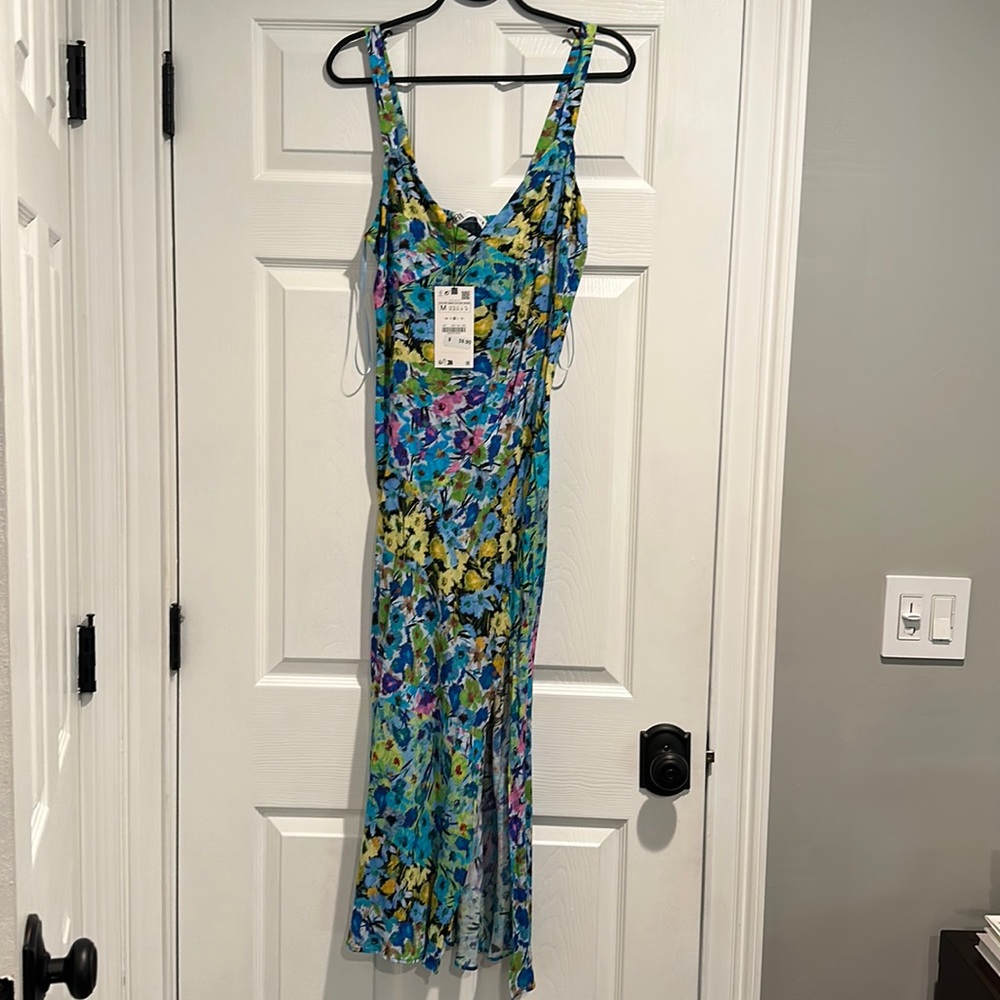 Printed multi color dress with matching top. Never worn and with tags